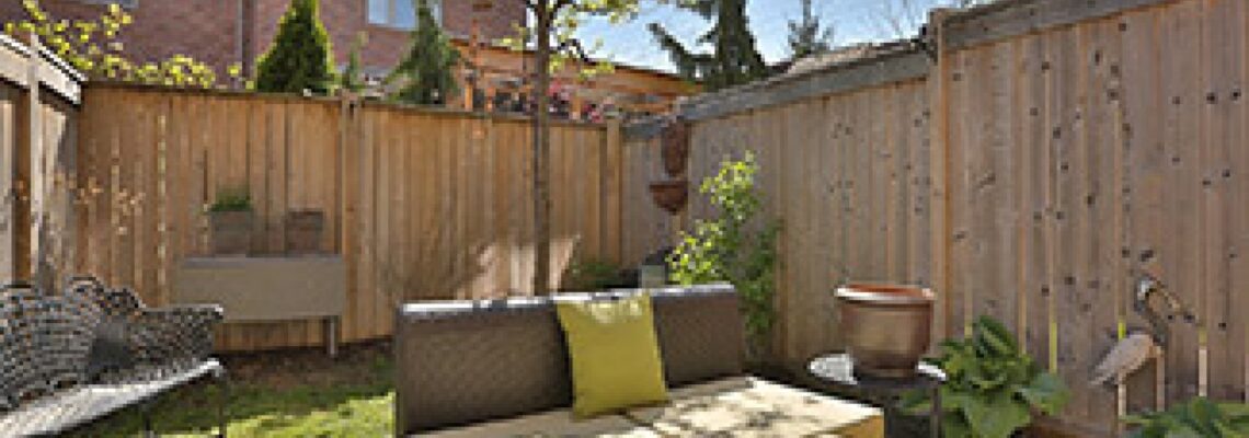 Cozy backyard patio with outdoor furniture.